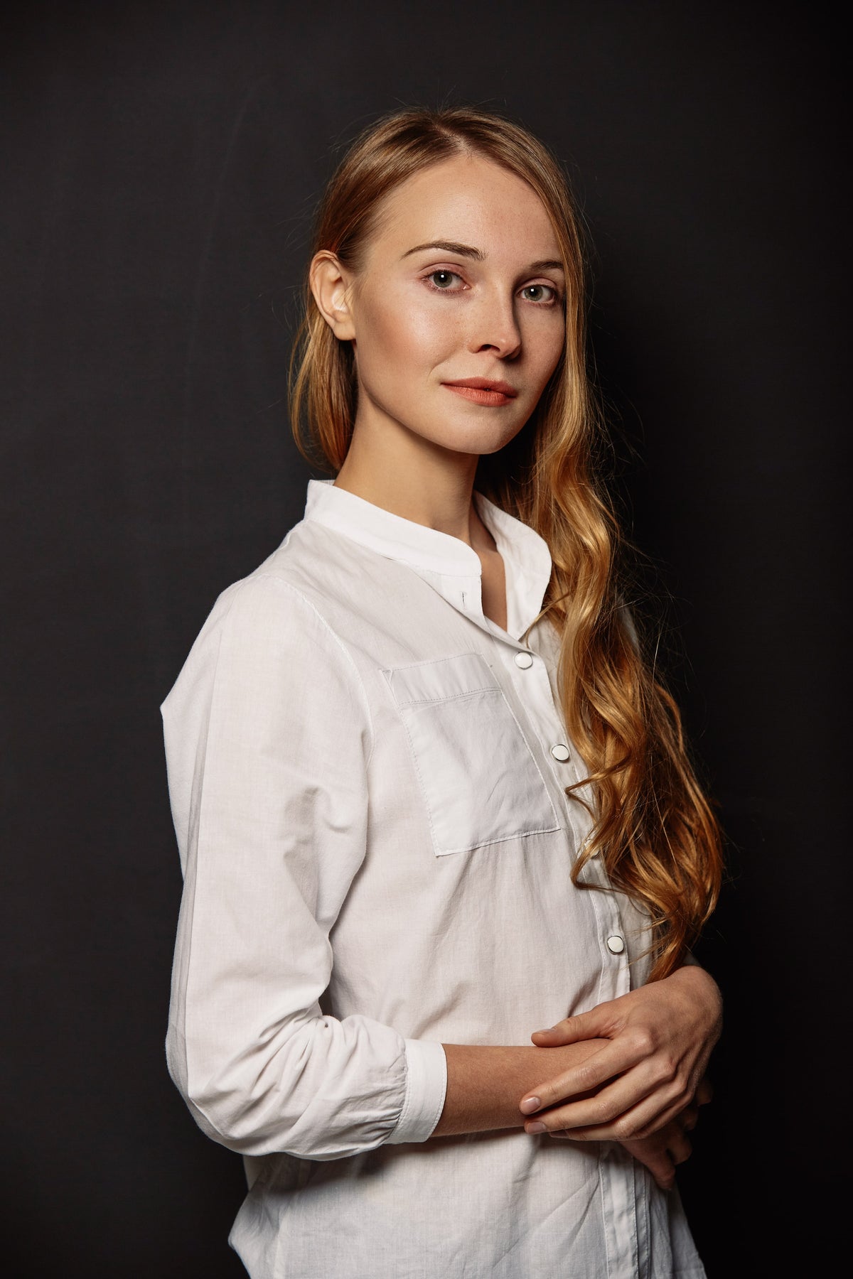 Womens white long sleeved button down shirt