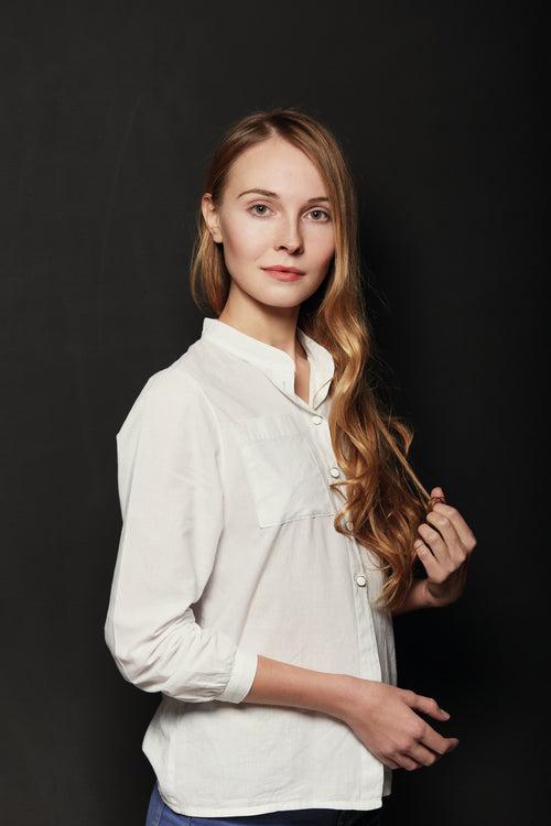 Womens white long sleeved button down shirt