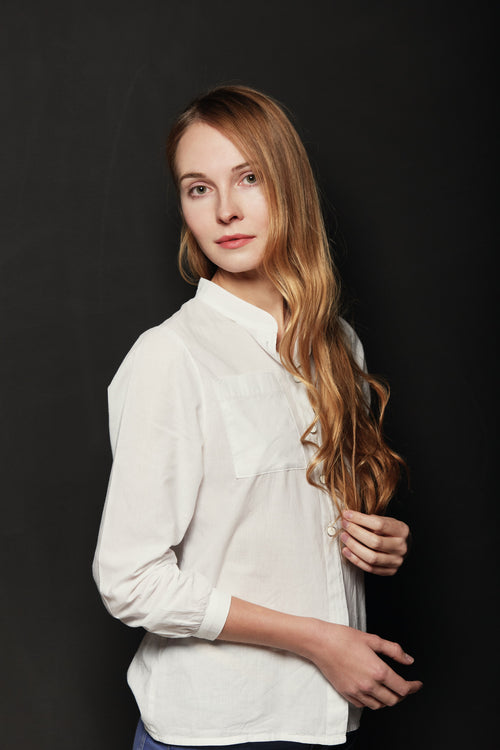Womens white long sleeved button down shirt